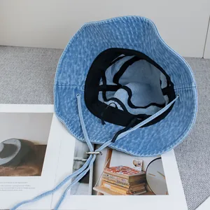 Vintage light blue denim bucket hat with adjustable chin strap and sun protection