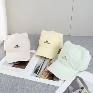 Macaron colored baseball caps with cat ears and M NIU NIU embroidery in three colors