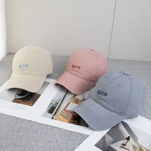 Detailed embroidery of Backing letters on three colored soft cotton baseball caps