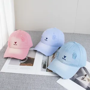 Pastel distressed baseball caps with heart embroidery in pink, purple, and sky blue