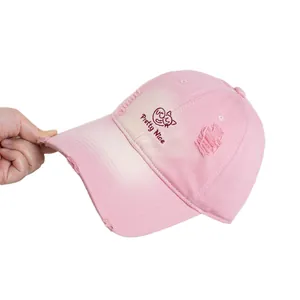 Distressed pink cotton baseball cap with cute cat embroidery and worn-out brim design