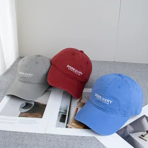 Washed cotton baseball caps with Discovery embroidery in grey, burgundy and blue