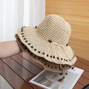 Cappello di Paglia da Donna Tessuto a Mano Con Perline di Legno Fiocco Protezione Solare Bohemienne Spiaggia Ombra Tesa Larga Pieghevole