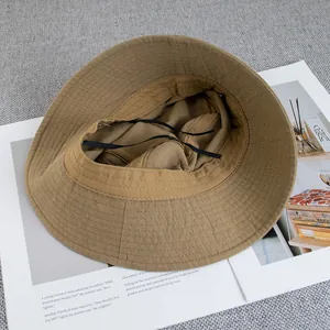Chapeau bob en coton kaki à bord large avec cordon de serrage intérieur réglable et style