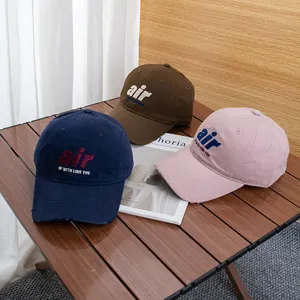 Vintage cotton baseball caps with air embroidery in navy, brown and pink colors