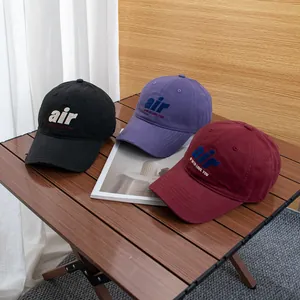 Vintage cotton baseball caps with air embroidery in black, purple, and burgundy colors