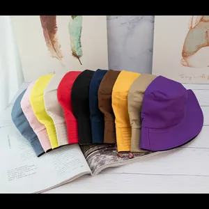 Minimalist cotton bucket hats for men and women in 11 assorted colors and flat stitching