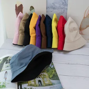 Double-sided cotton sun hat for women and men, available in multiple solid colors