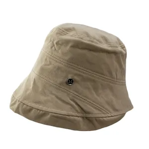Foldable khaki cotton bucket hat with a metal M buckle and stitched brim design