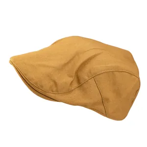 Retro khaki cotton newsboy cap with classic paneled design and stiff brim on white background
