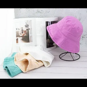Pastellfarbene Fischerhüte für Damen in Rosa, Gelb und Blau für den Sonnenschutz
