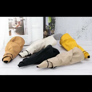 Foldable UV protection sun visors in five colors featuring elastic storage bands