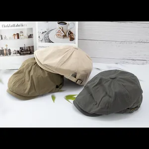Classic cotton newsboy caps in khaki, green and grey with adjustable metal buckle strap