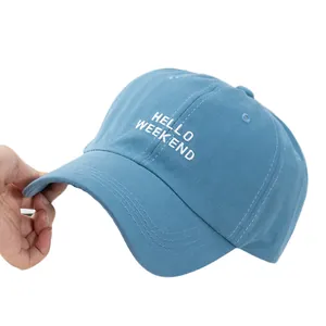 Sky blue cotton baseball cap with HELLO WEEKEND embroidery and curved brim