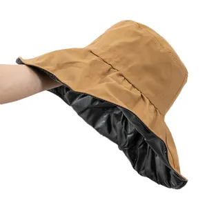 Reversible khaki and black UV sun hat with wide brim for sun protection