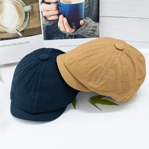 Classic vintage newsboy cap in navy and khaki cotton, stylish octagonal hat for daily wear