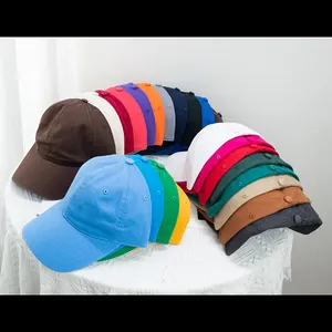Detailed assortment of colorful washed cotton baseball caps arranged on a table