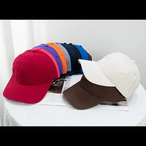 Classic washed cotton baseball caps in multiple colors featuring a soft top and curved brim