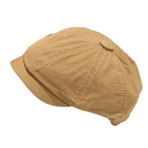 Classic khaki cotton newsboy cap with multi-panel stitching and twill texture