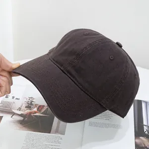 Detail of soft cotton washed baseball cap showing canvas texture and stitching