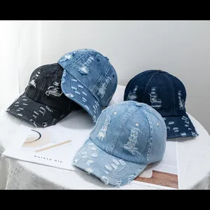 Distressed denim baseball caps in four colors featuring vintage ripped details and worn look