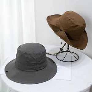 Adjustable sun hats with wide brims and windproof cords in brown and dark gray colors
