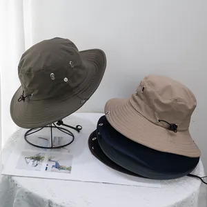 Quick-dry outdoor sun hat with wide brim and adjustable drawstring for hiking and fishing