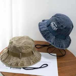 Vintage washed cotton hiking hats in khaki and denim blue with embroidery and windproof cord