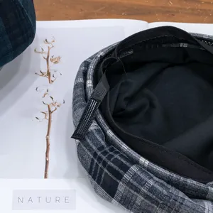British vintage plaid beret hat in gray and black with internal lining and stitching