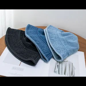 Classic denim bucket hats for women in black, dark blue, and light blue shades