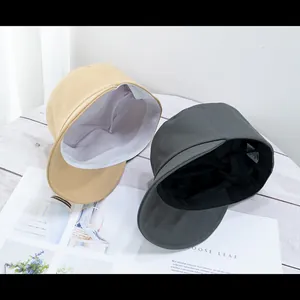 Classic black military style flat top cap with adjustable interior lining for women