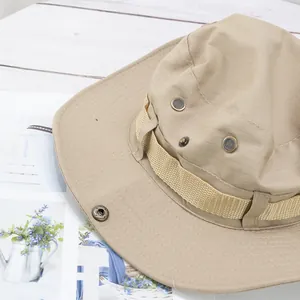 Close-up of khaki sun hat with breathable mesh vents and ripstop fabric texture