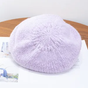 Detailed macro view of the light purple mohair beret showing its soft knitted texture