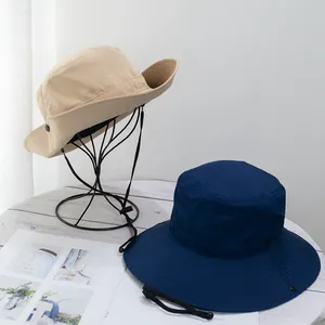 Quick-dry outdoor sun hat with adjustable chin strap and side snaps for hiking