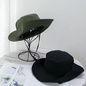 Quick-dry wide brim sun hats in green and black with adjustable chin straps for hiking