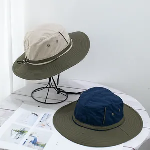 Outdoor wide brim sun hat with drawstring and side vents in beige and olive green
