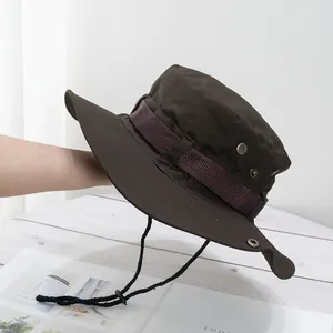 Detail of outdoor sun hat with wide brim, metal vents and adjustable wind rope