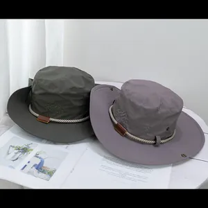 Detailed embroidery of mountain pattern and travellers text on outdoor sun hats