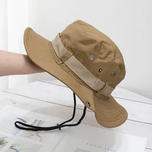 Detail of khaki tactical boonie hat with ripstop fabric texture and adjustable chin strap