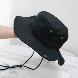 Detail of outdoor sun hat with metal air vents, adjustable chin strap and tactical band