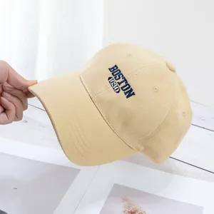 Close-up of premium cotton baseball cap with navy Boston 1630 embroidery details