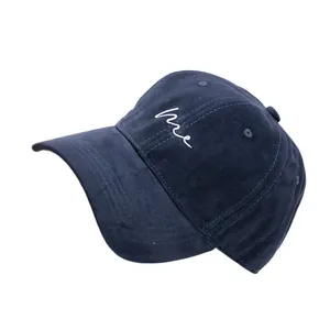 Navy blue cotton baseball cap with white me letter embroidery in a classic 6-panel design