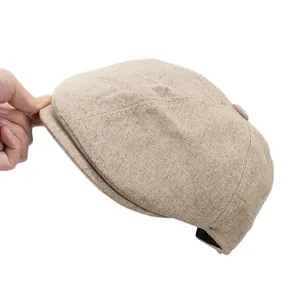 Berretto retrò in misto lino beige con trama tessuta traspirante e tesa corta per donna