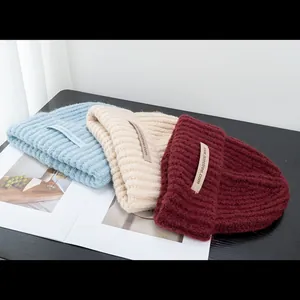 Women wool blend knitted beanie hats in light blue, beige, and deep burgundy colors