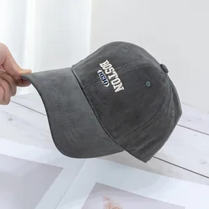 Detailed embroidery of BOSTON 1930 letters on a premium dark gray cotton baseball cap