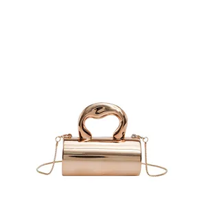 Chic rose gold cylindrical acrylic handbag with curved top handle and elegant chain strap