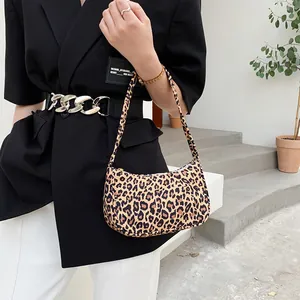 Fashionable leopard print hobo shoulder bag for women with a stylish contrast design