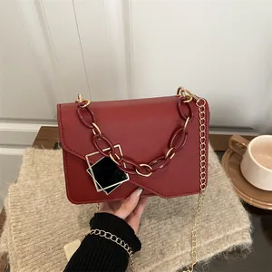 Elegant dark red crossbody chain bag for women with geometric design and resin detail