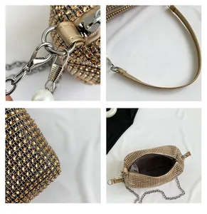 Detailed macro view of the rhinestone evening bag with elegant pearl zipper pendant
