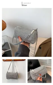 Detailed views of a silver rhinestone evening bag with pearl zipper and chain strap